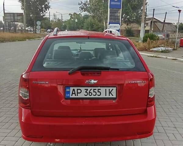 Красный Шевроле Нубира, объемом двигателя 1.6 л и пробегом 235 тыс. км за 4500 $, фото 5 на Automoto.ua