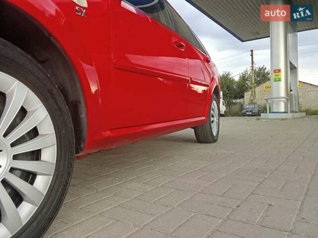 Красный Шевроле Нубира, объемом двигателя 1.6 л и пробегом 235 тыс. км за 4500 $, фото 33 на Automoto.ua