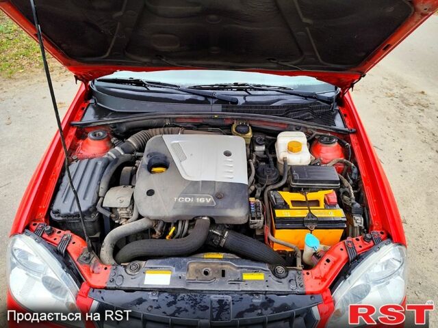 Красный Шевроле Нубира, объемом двигателя 2 л и пробегом 278 тыс. км за 4799 $, фото 11 на Automoto.ua