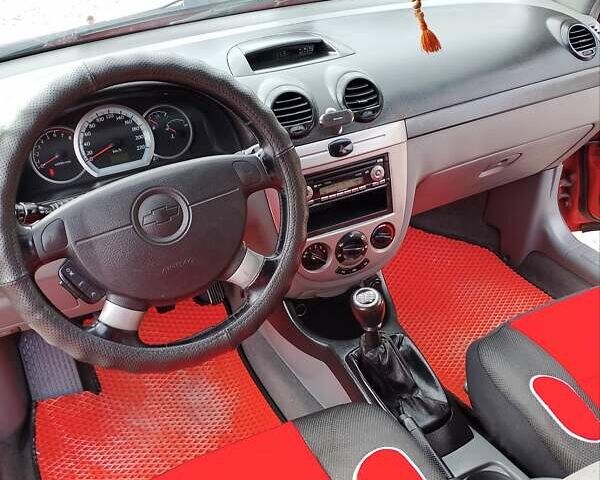 Красный Шевроле Нубира, объемом двигателя 1.6 л и пробегом 236 тыс. км за 3700 $, фото 9 на Automoto.ua