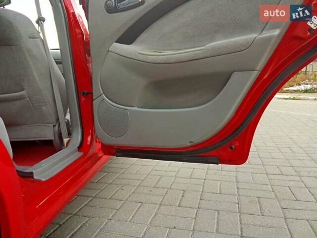 Красный Шевроле Нубира, объемом двигателя 1.6 л и пробегом 235 тыс. км за 4500 $, фото 29 на Automoto.ua