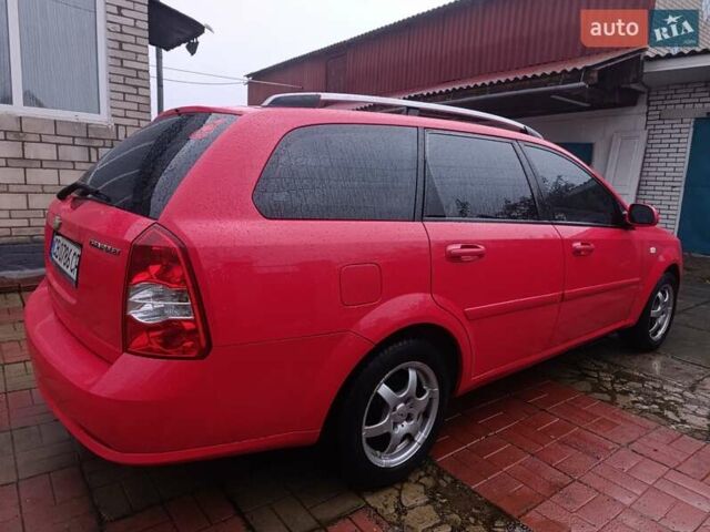 Красный Шевроле Нубира, объемом двигателя 1.6 л и пробегом 235 тыс. км за 3900 $, фото 5 на Automoto.ua