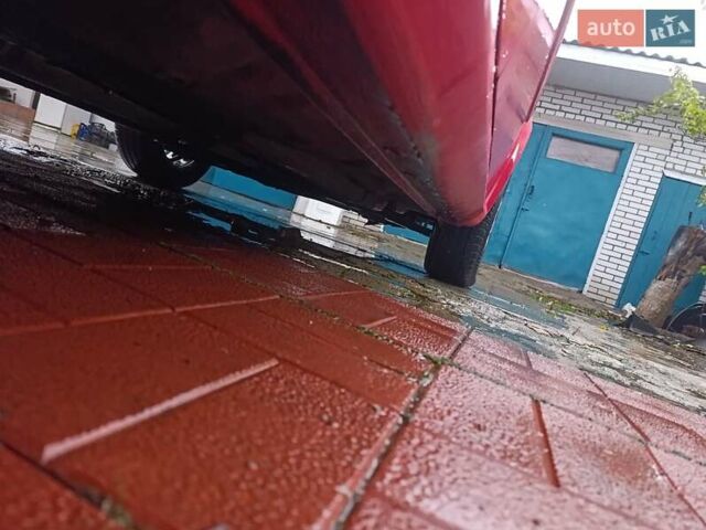 Красный Шевроле Нубира, объемом двигателя 1.6 л и пробегом 235 тыс. км за 3900 $, фото 17 на Automoto.ua