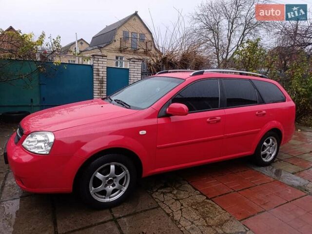 Красный Шевроле Нубира, объемом двигателя 1.6 л и пробегом 235 тыс. км за 3900 $, фото 2 на Automoto.ua