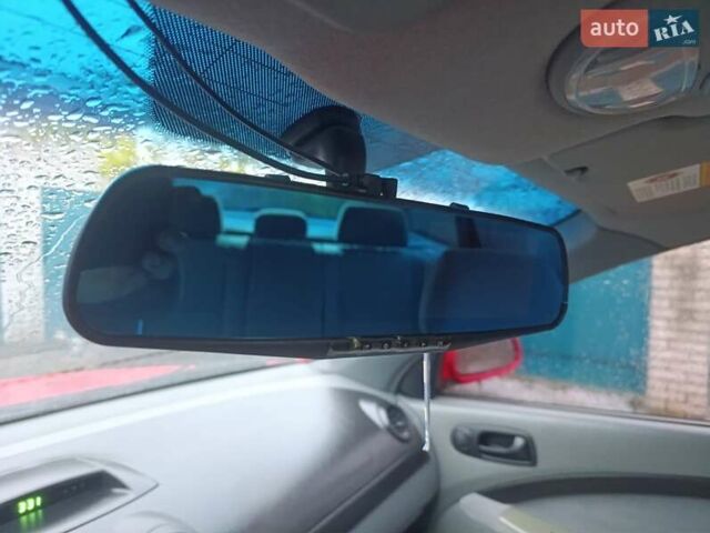 Красный Шевроле Нубира, объемом двигателя 1.6 л и пробегом 235 тыс. км за 3900 $, фото 25 на Automoto.ua