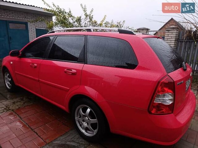 Красный Шевроле Нубира, объемом двигателя 1.6 л и пробегом 235 тыс. км за 3900 $, фото 6 на Automoto.ua