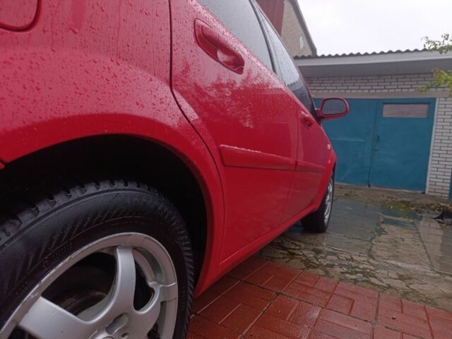 Красный Шевроле Нубира, объемом двигателя 1.6 л и пробегом 235 тыс. км за 3900 $, фото 13 на Automoto.ua