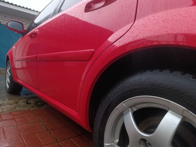 Красный Шевроле Нубира, объемом двигателя 1.6 л и пробегом 235 тыс. км за 3900 $, фото 14 на Automoto.ua