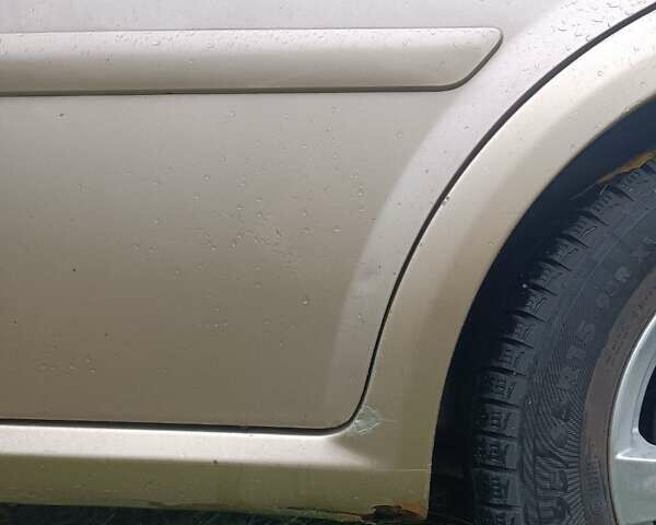 Желтый Шевроле Нубира, объемом двигателя 1.8 л и пробегом 444 тыс. км за 3500 $, фото 17 на Automoto.ua