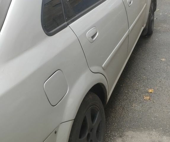 Сірий Шевроле Нубіра, об'ємом двигуна 1.8 л та пробігом 202 тис. км за 3500 $, фото 3 на Automoto.ua