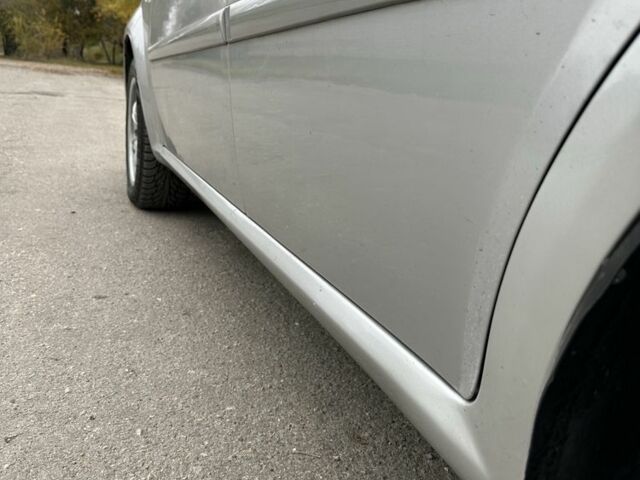 Серый Шевроле Нубира, объемом двигателя 1.8 л и пробегом 170 тыс. км за 3650 $, фото 6 на Automoto.ua