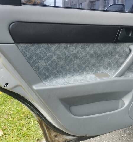 Сірий Шевроле Нубіра, об'ємом двигуна 1.8 л та пробігом 202 тис. км за 3500 $, фото 4 на Automoto.ua