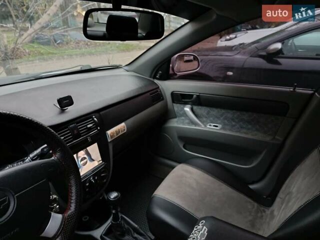 Серый Шевроле Нубира, объемом двигателя 1.6 л и пробегом 332 тыс. км за 3900 $, фото 8 на Automoto.ua
