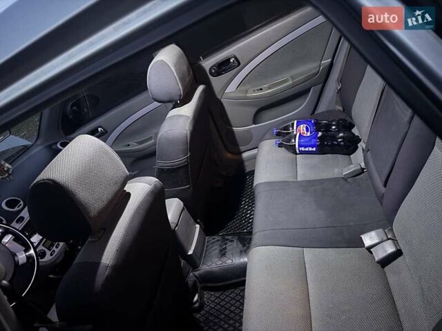 Серый Шевроле Нубира, объемом двигателя 1.8 л и пробегом 257 тыс. км за 3500 $, фото 1 на Automoto.ua