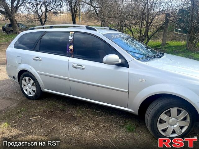 Сірий Шевроле Нубіра, об'ємом двигуна 16 л та пробігом 300 тис. км за 4800 $, фото 2 на Automoto.ua