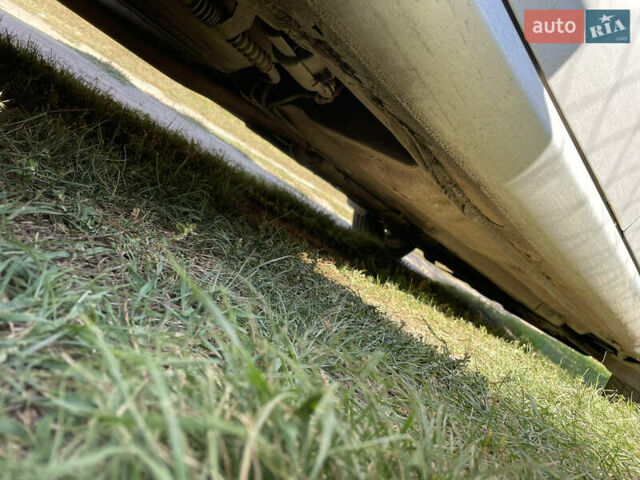 Серый Шевроле Нубира, объемом двигателя 1.8 л и пробегом 352 тыс. км за 3700 $, фото 7 на Automoto.ua