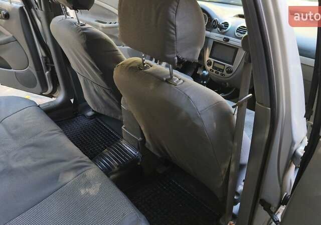 Серый Шевроле Нубира, объемом двигателя 1.8 л и пробегом 201 тыс. км за 4800 $, фото 12 на Automoto.ua