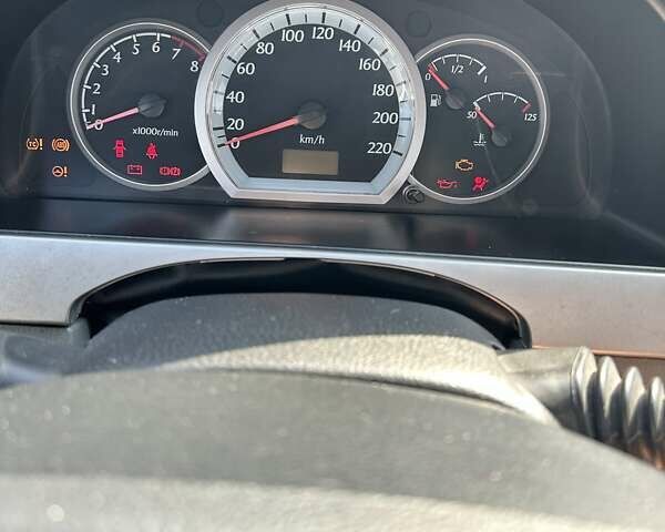 Серый Шевроле Нубира, объемом двигателя 1.8 л и пробегом 264 тыс. км за 5555 $, фото 12 на Automoto.ua