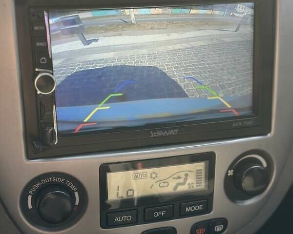 Серый Шевроле Нубира, объемом двигателя 1.8 л и пробегом 264 тыс. км за 5555 $, фото 11 на Automoto.ua