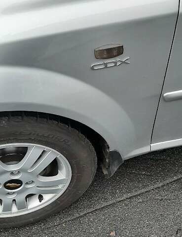 Серый Шевроле Нубира, объемом двигателя 1.8 л и пробегом 156 тыс. км за 5900 $, фото 3 на Automoto.ua