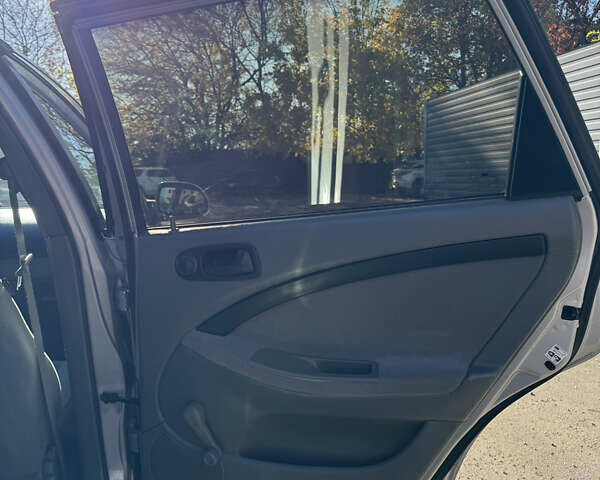 Серый Шевроле Нубира, объемом двигателя 1.6 л и пробегом 264 тыс. км за 4500 $, фото 28 на Automoto.ua