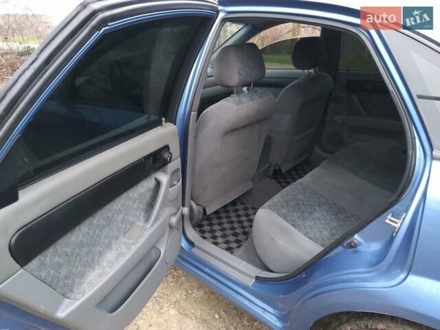 Синий Шевроле Нубира, объемом двигателя 1.8 л и пробегом 264 тыс. км за 3700 $, фото 10 на Automoto.ua