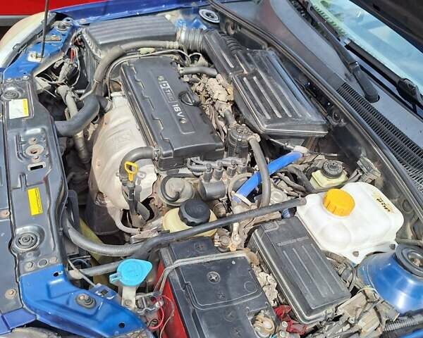 Синий Шевроле Нубира, объемом двигателя 1.8 л и пробегом 270 тыс. км за 3999 $, фото 4 на Automoto.ua