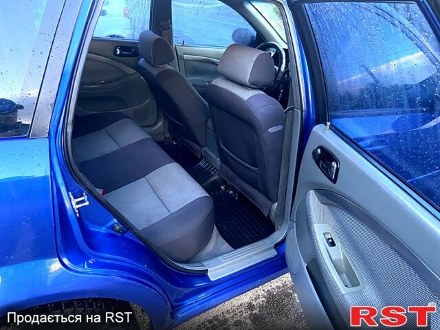 Синій Шевроле Нубіра, об'ємом двигуна 1.8 л та пробігом 250 тис. км за 4000 $, фото 3 на Automoto.ua