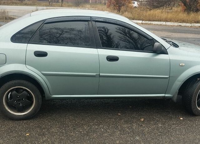 Зеленый Шевроле Нубира, объемом двигателя 1.6 л и пробегом 294 тыс. км за 3499 $, фото 9 на Automoto.ua