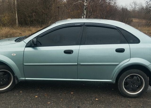 Зеленый Шевроле Нубира, объемом двигателя 1.6 л и пробегом 294 тыс. км за 3499 $, фото 5 на Automoto.ua