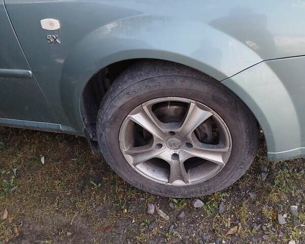 Зеленый Шевроле Нубира, объемом двигателя 1.6 л и пробегом 245 тыс. км за 3900 $, фото 3 на Automoto.ua