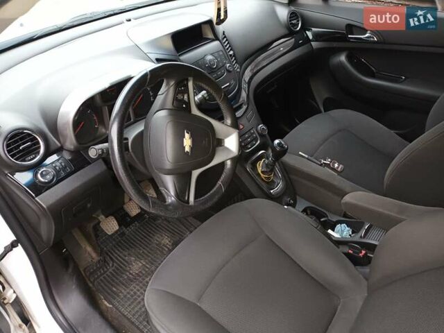 Белый Шевроле Орландо, объемом двигателя 1.8 л и пробегом 180 тыс. км за 8900 $, фото 29 на Automoto.ua