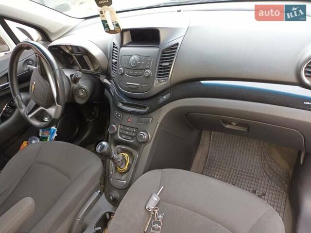 Белый Шевроле Орландо, объемом двигателя 1.8 л и пробегом 180 тыс. км за 8900 $, фото 11 на Automoto.ua