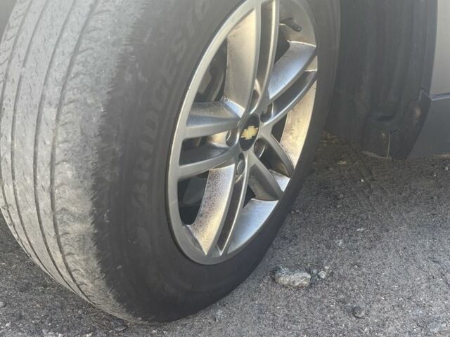 Білий Шевроле Орландо, об'ємом двигуна 2 л та пробігом 190 тис. км за 8200 $, фото 17 на Automoto.ua