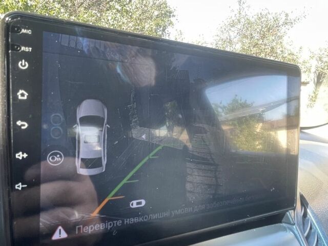 Білий Шевроле Орландо, об'ємом двигуна 2 л та пробігом 190 тис. км за 8200 $, фото 9 на Automoto.ua