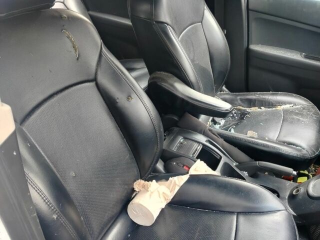 Белый Шевроле Орландо, объемом двигателя 2 л и пробегом 178 тыс. км за 3200 $, фото 5 на Automoto.ua