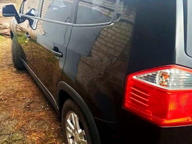 Черный Шевроле Орландо, объемом двигателя 1.8 л и пробегом 269 тыс. км за 8555 $, фото 2 на Automoto.ua