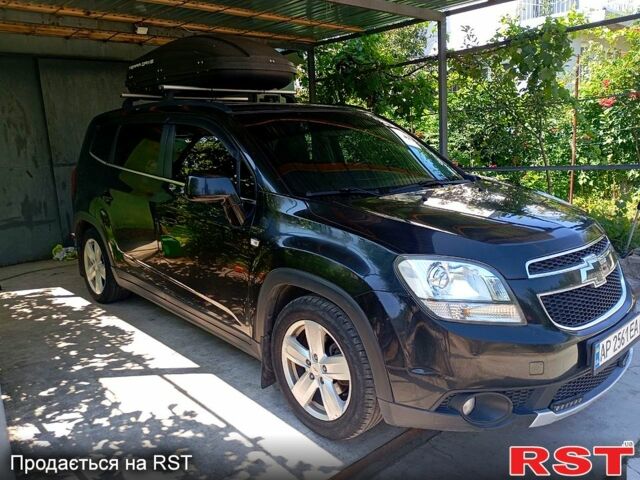 Черный Шевроле Орландо, объемом двигателя 1.8 л и пробегом 194 тыс. км за 7900 $, фото 3 на Automoto.ua