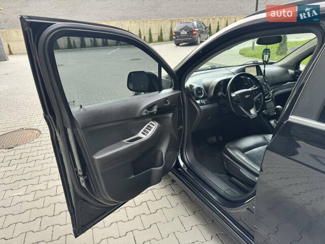 Шевроле Орландо 2012 в Хмельницком на Automoto.ua Черный Шевроле Орландо, объемом двигателя 2 л и пробегом 207 тыс. км за 8700 $, фото 15 на Automoto.ua