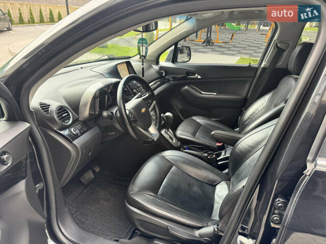 Шевроле Орландо 2012 в Хмельницком на Automoto.ua Черный Шевроле Орландо, объемом двигателя 2 л и пробегом 207 тыс. км за 8700 $, фото 13 на Automoto.ua