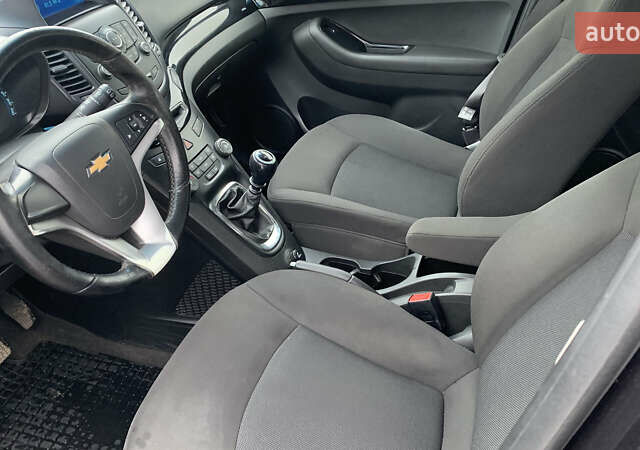 Черный Шевроле Орландо, объемом двигателя 1.8 л и пробегом 149 тыс. км за 7800 $, фото 11 на Automoto.ua