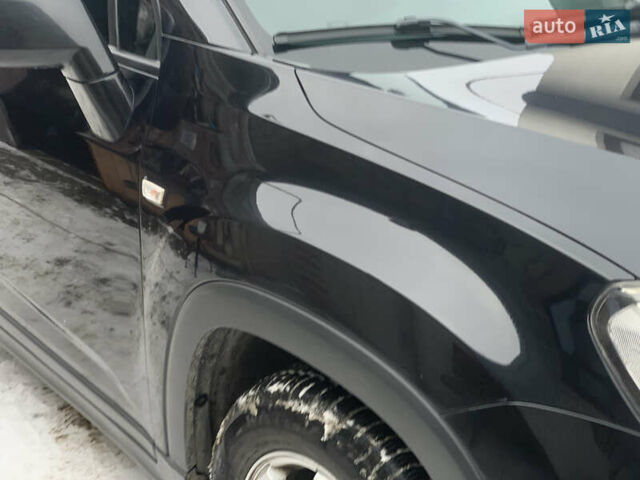 Черный Шевроле Орландо, объемом двигателя 1.8 л и пробегом 149 тыс. км за 7800 $, фото 2 на Automoto.ua
