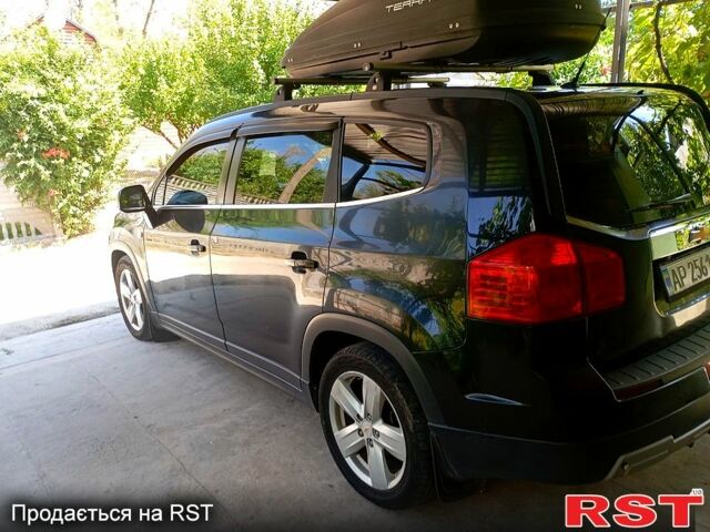 Черный Шевроле Орландо, объемом двигателя 1.8 л и пробегом 194 тыс. км за 7900 $, фото 1 на Automoto.ua