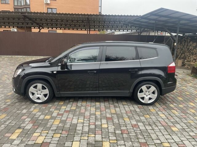 Черный Шевроле Орландо, объемом двигателя 2 л и пробегом 292 тыс. км за 8200 $, фото 1 на Automoto.ua