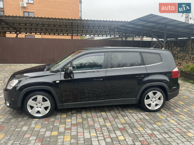 Черный Шевроле Орландо, объемом двигателя 2 л и пробегом 292 тыс. км за 8200 $, фото 1 на Automoto.ua