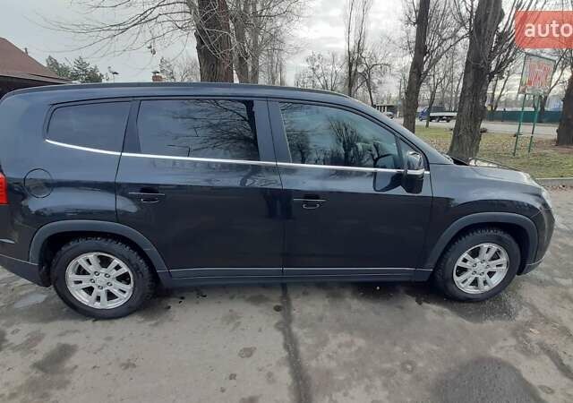 Черный Шевроле Орландо, объемом двигателя 1.8 л и пробегом 65 тыс. км за 10000 $, фото 5 на Automoto.ua