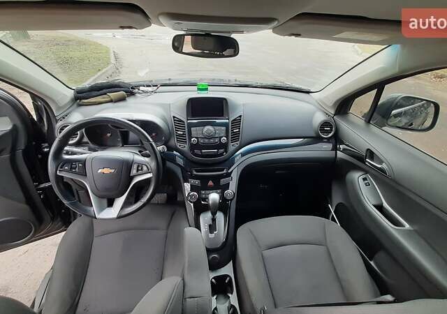 Черный Шевроле Орландо, объемом двигателя 1.8 л и пробегом 65 тыс. км за 10000 $, фото 8 на Automoto.ua