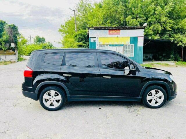 Черный Шевроле Орландо, объемом двигателя 2 л и пробегом 290 тыс. км за 11600 $, фото 1 на Automoto.ua