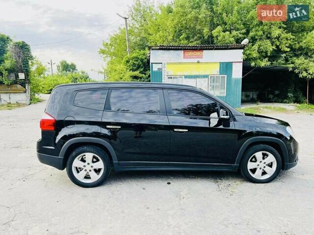 Черный Шевроле Орландо, объемом двигателя 2 л и пробегом 290 тыс. км за 11600 $, фото 1 на Automoto.ua