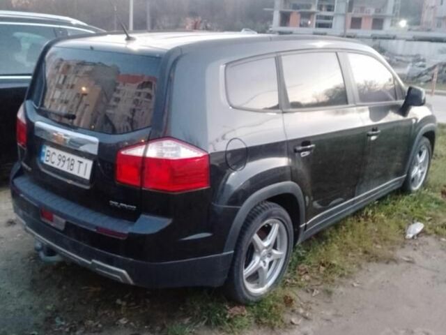 Черный Шевроле Орландо, объемом двигателя 1.8 л и пробегом 160 тыс. км за 7700 $, фото 1 на Automoto.ua